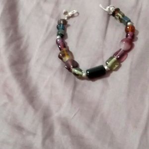 A handmaid glass beaded bracelet.